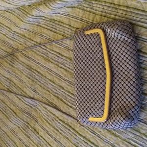 Vintage beaded purse with shoulder length strap.leather inside with two pockets.